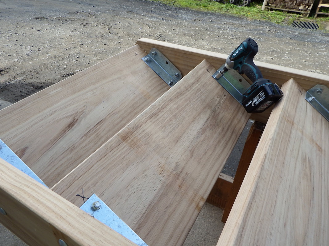 Use a spanner or drill with socket tighten tread nuts followed by those on the stringers. The stair unit will pull up tight and straight.